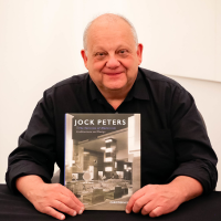 Author Christopher Long with his book