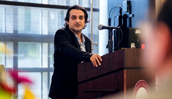 Prof. John Tehraninan at podium at Entertainment & Sports Law Symposium at Chapman University, Fowler School of Law