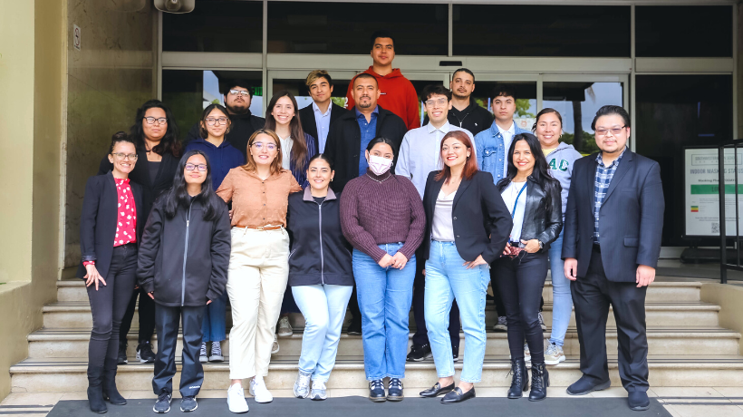 ELAC students take a group photo on the steps of Southwestern Law Schools' Westmoreland building with Heidy Caceres and SWLAW student panelists. 