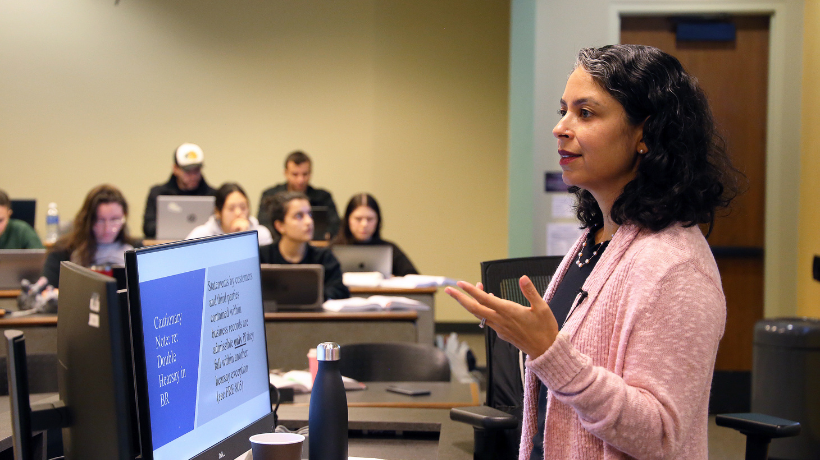 Prof. Meera Deo lecturing in classroom