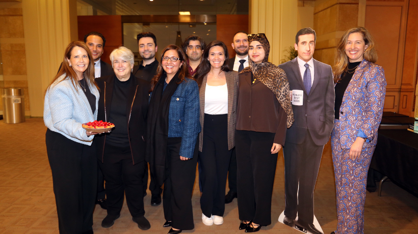 The winning group (from left to right): Front row: Associate Dean Bridgette de Gyarfas ’94; Dean Darby Dickerson; Sanam Yasseri ’09; Lauren Hughes-Leslie ’24; Sarah Dhaou (SCALE II); Lauren Sinclair (2L). Back row: Gabriel Cortes (SCALE II); Arman Avagyan ’22; Sohin Gautam ’15; Andrew Lutfala ’23.