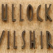Bullocks Wilshire lettering in bronze