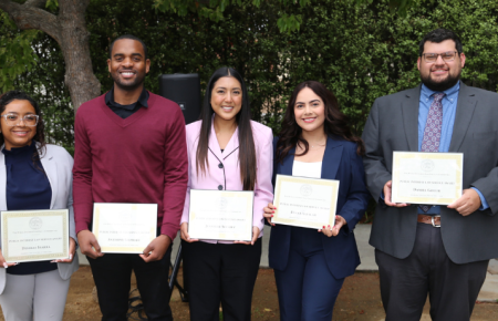 PSP Graduating Student Award recipients holding up their awards
