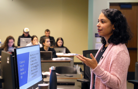 Prof. Meera Deo lecturing in classroom