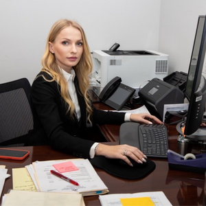 Elena Cordonean at her desk