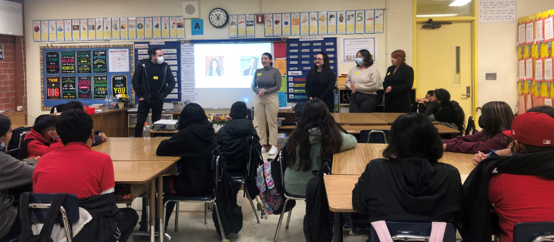 Candid photo of Hoover Elementary School students in class with Southwestern students