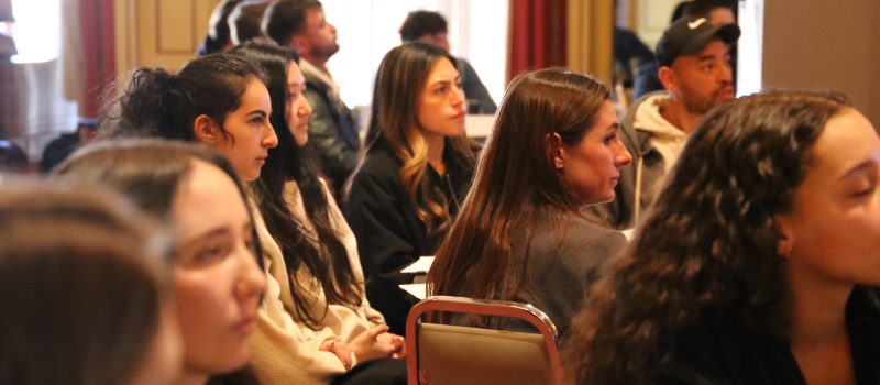Candid photo of Students listening at Parris Academy event