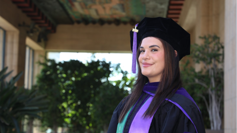 2026 Commencement Speaker Christina S. Sorfazian headshot in cap and gown