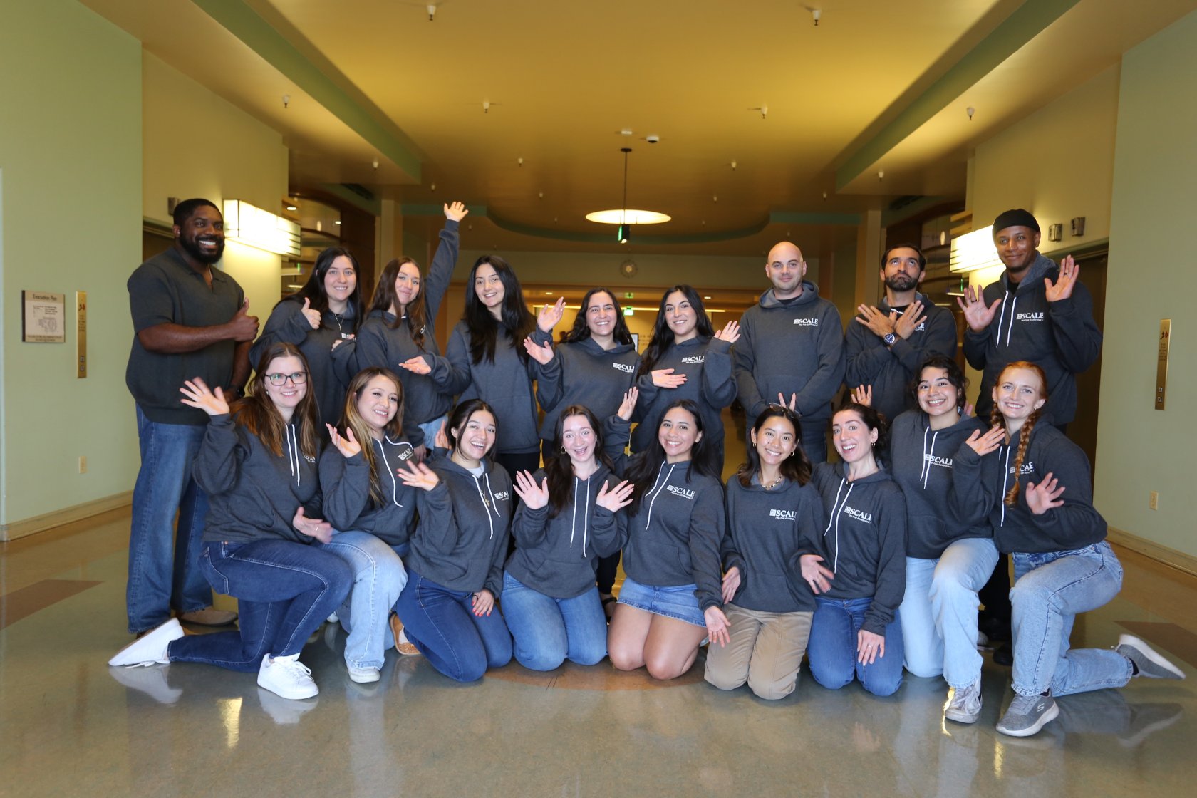SCALE Ambassadors group photo cheering