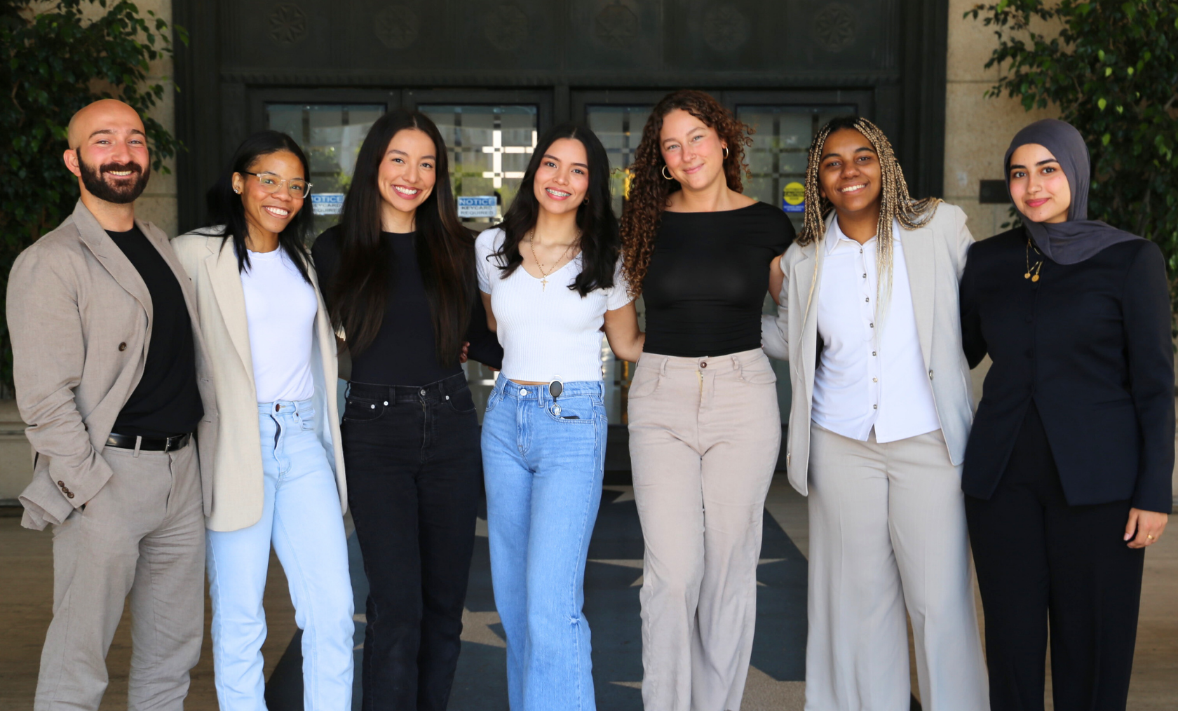 Group of seven SCALE students smiling