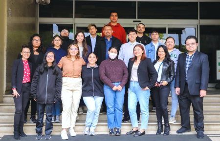 ELAC students take a group photo on the steps of Southwestern Law Schools' Westmoreland building with Heidy Caceres and SWLAW student panelists. 