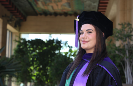 2026 Commencement Speaker Christina S. Sorfazian headshot in cap and gown
